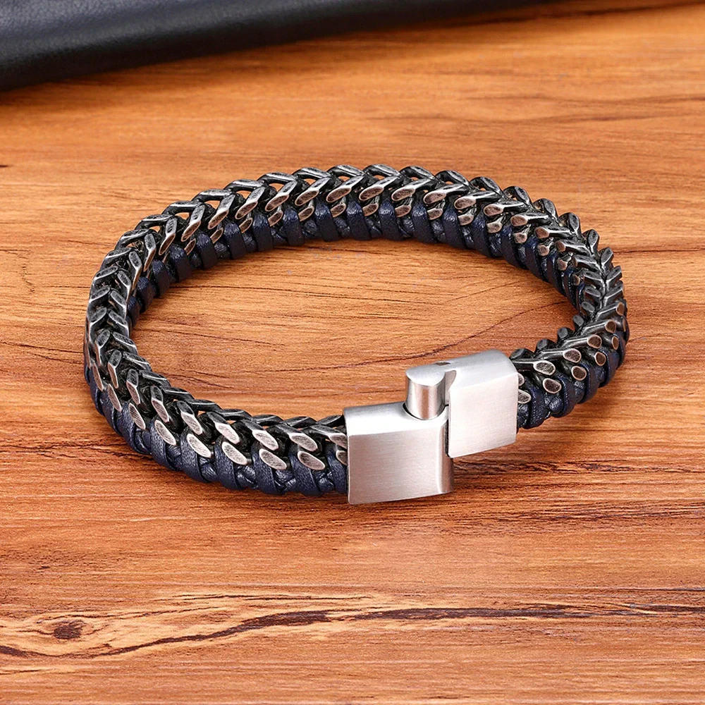 Stylish men's leather cuff bracelet with stainless steel clasp.
