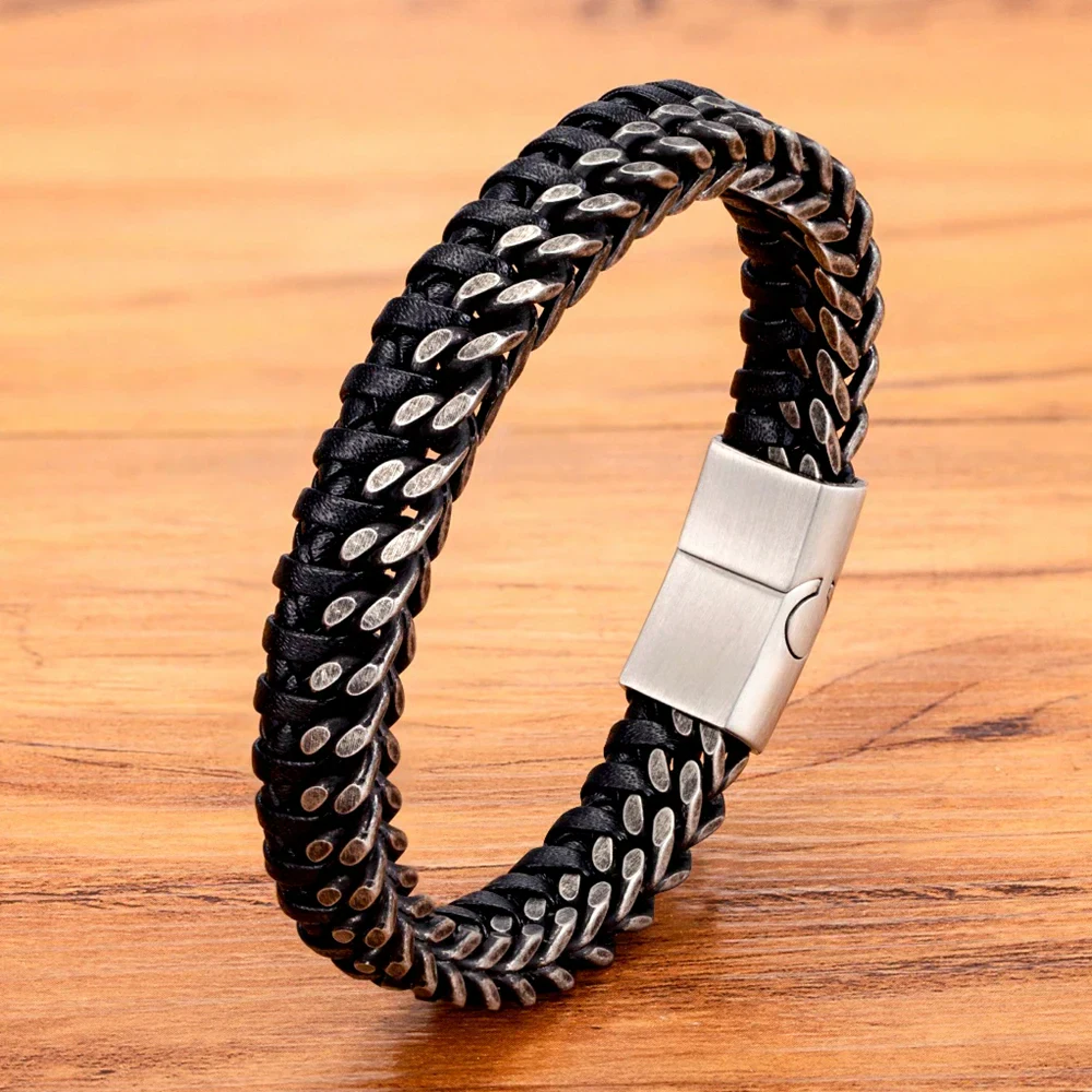 Men's black leather bracelet with stainless steel accents and magnetic clasp.