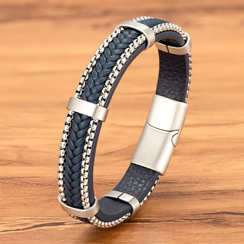 Stylish men's leather bracelet with silver chain accents and magnetic clasp. Perfect for everyday or special occasions.