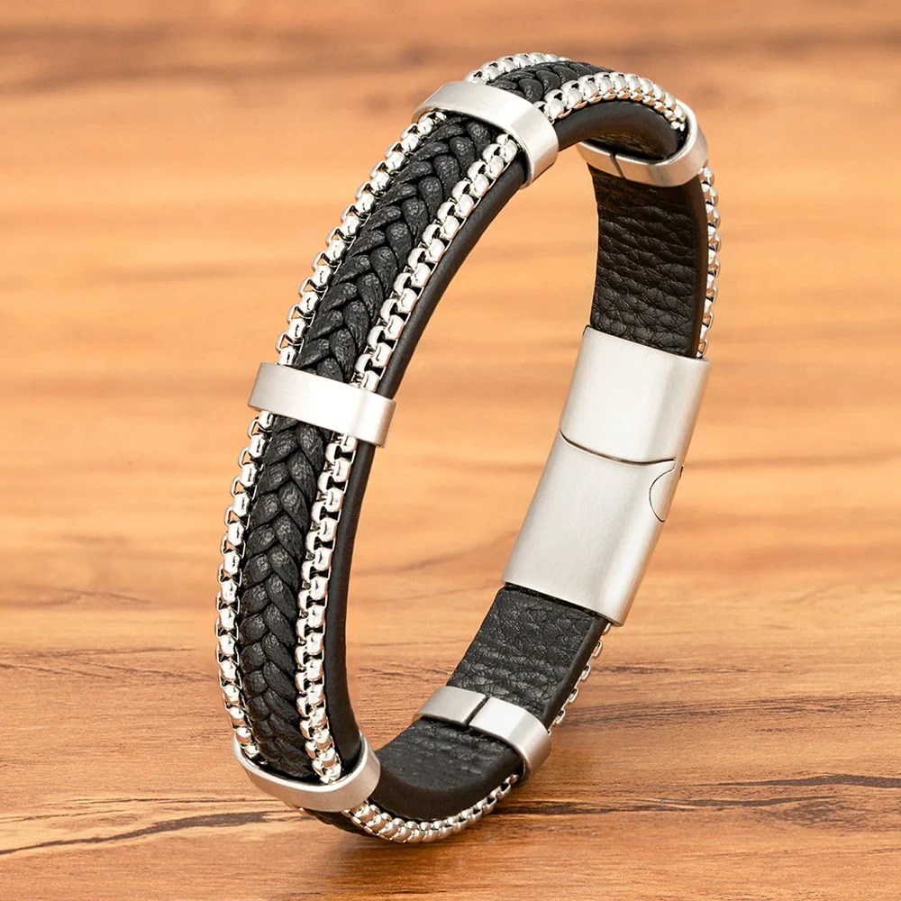 High-quality black leather bracelet featuring silver chain details and magnetic clasp, perfect for men’s fashion.