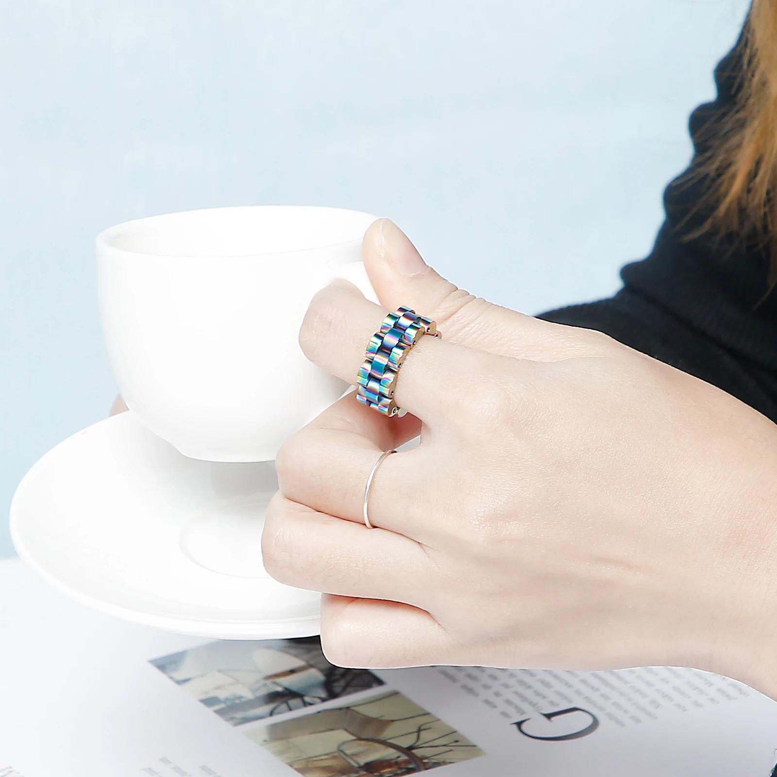 Colorful rainbow opal jewelry ring for women, stylish accessory, adjustable fit.