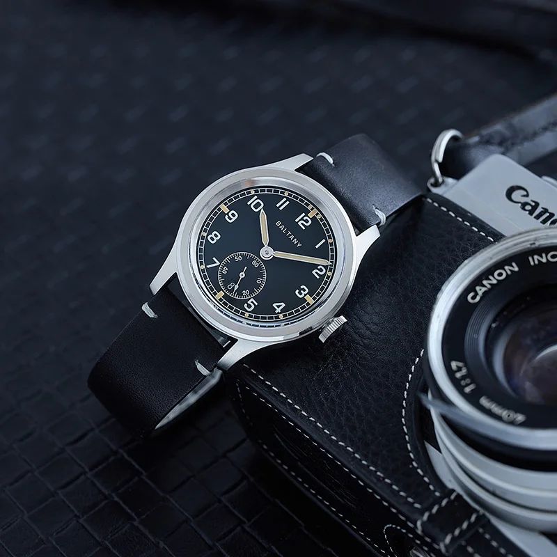 High-quality Baltic navy wristwatch with black leather strap and vintage-inspired dial. Perfect for stylish everyday wear.