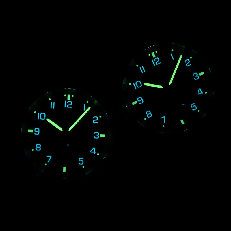 Luminous glow-in-the-dark watch dials with glowing hands and markers for nighttime visibility.