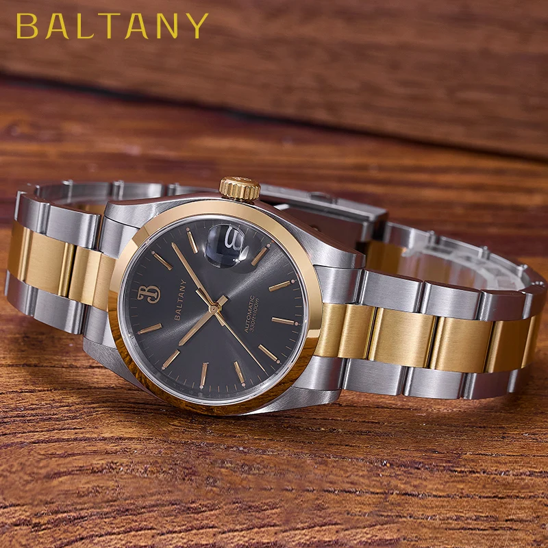 Elegant two-tone men's wristwatch with gold and stainless steel finish.