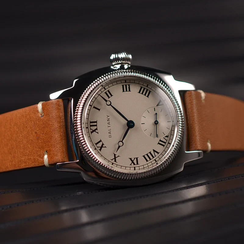 Luxury men's wristwatch featuring leather band and classic Roman numeral dial.