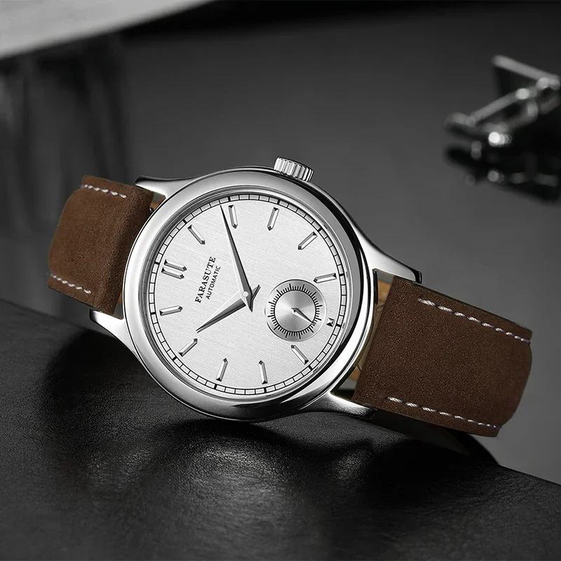 Luxury men's wristwatch with silver dial, brown leather strap, and sub-dial design. Perfect for stylish occasions.