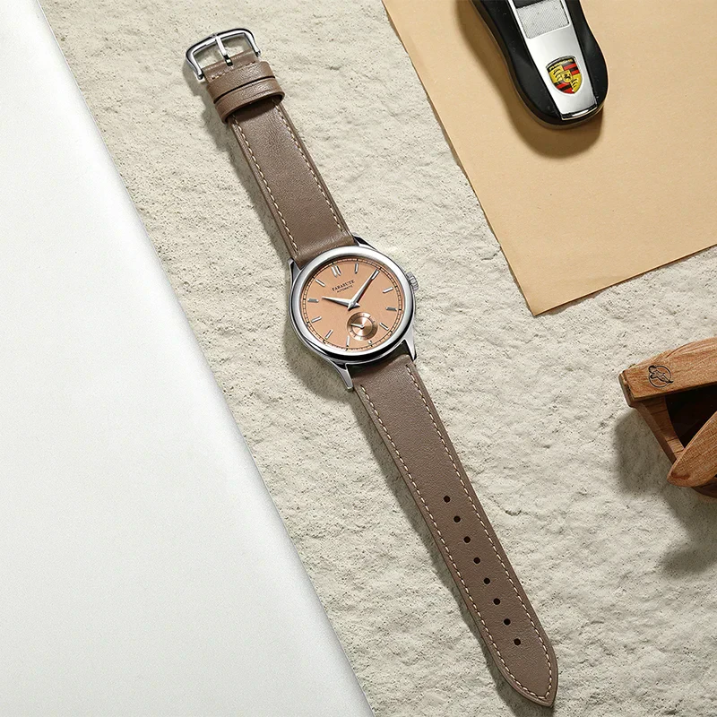 High-quality leather strap watch with beige dial, perfect for elegant and casual styles.
