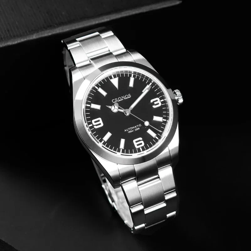 Luxury men's stainless steel wristwatch featuring a black dial and white luminous markers.