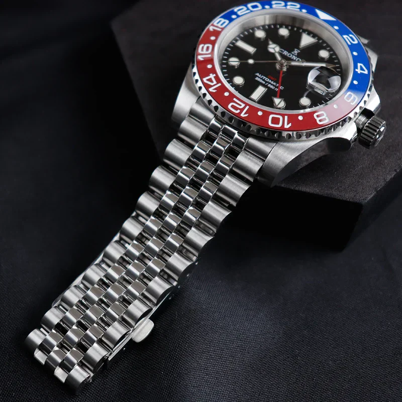 High-quality stainless steel wristwatch with GMT dual-time bezel, automatic movement, and scratch-resistant crystal.
