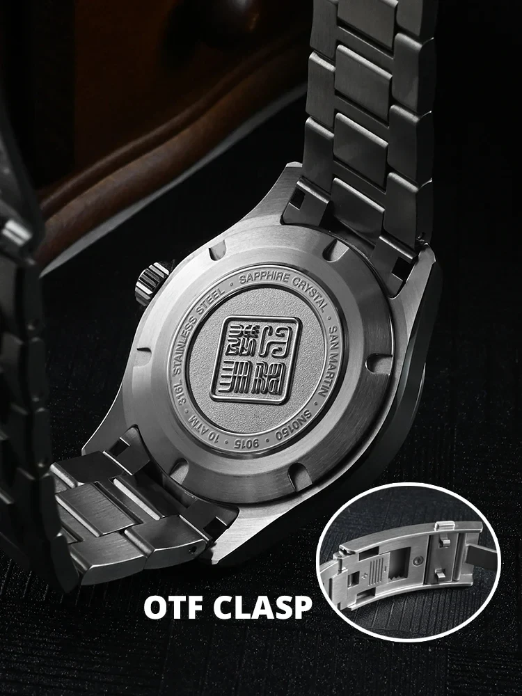 Stainless steel watch back with OTF clasp and engraved details, sleek design, and 10 ATM water resistance.