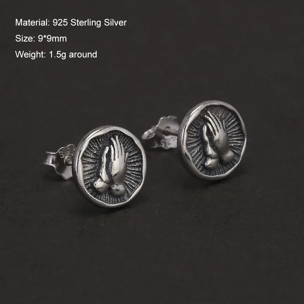 Silver Religious Coin-Style Earrings with Praying Hands Design.