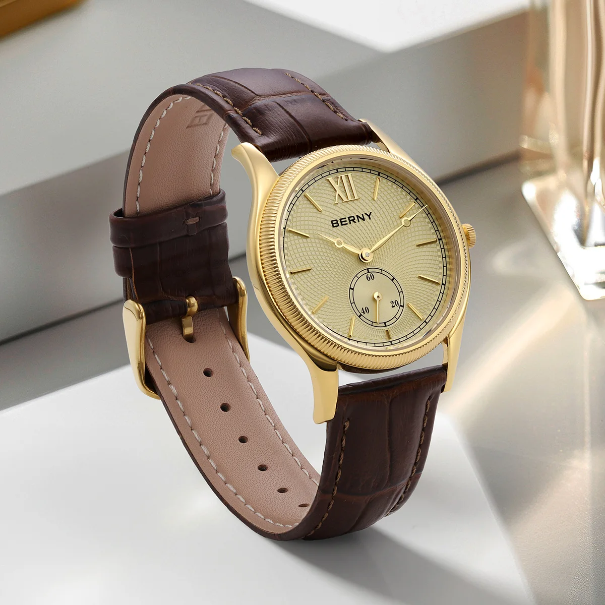 Gold watch with leather strap for women.