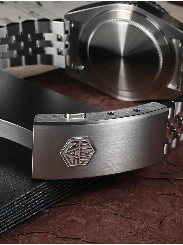GMT diver's watch with stainless steel bracelet and sapphire bezel.
