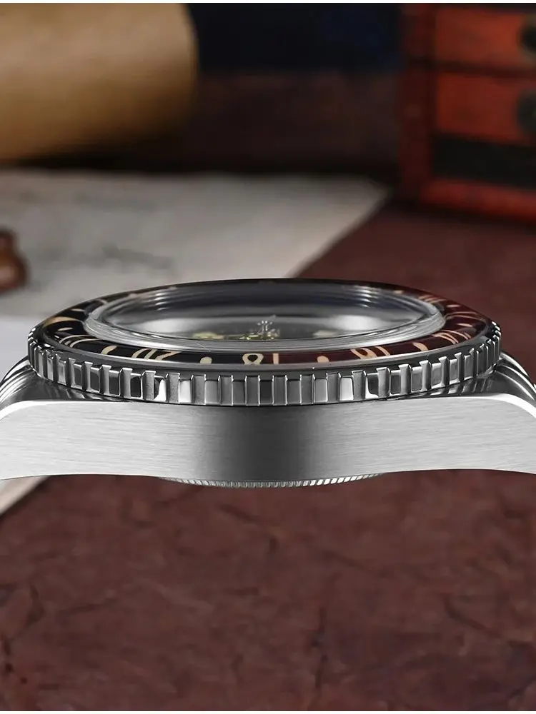 Diver's watch with sapphire bezel, 5-link bracelet, and fly clasp for men.