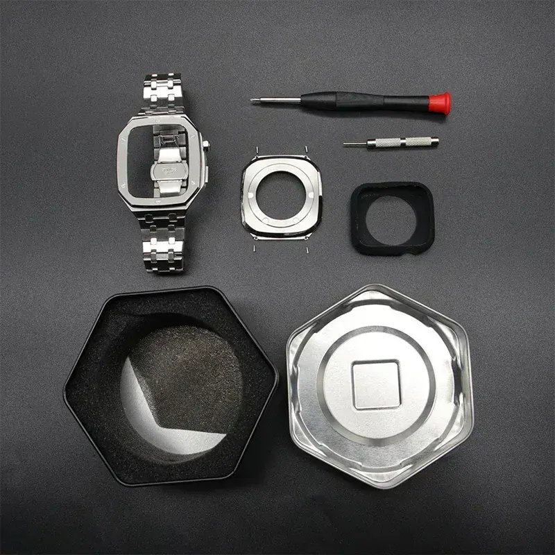 Apple Watch metal modification kit with tools and stainless steel strap components.