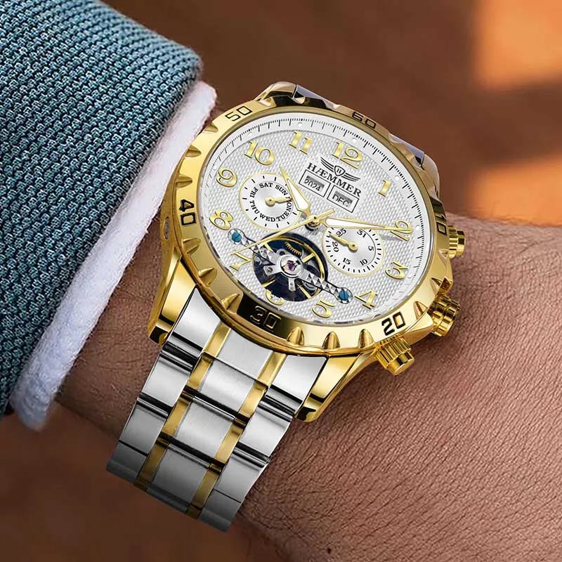 Elegant men's stainless steel waterproof watch with gold accents.