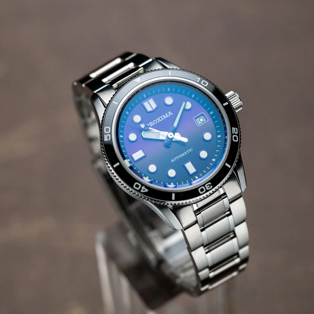 Proxima PX1747 39mm men's automatic watch with sunburst dial and ceramic bezel.