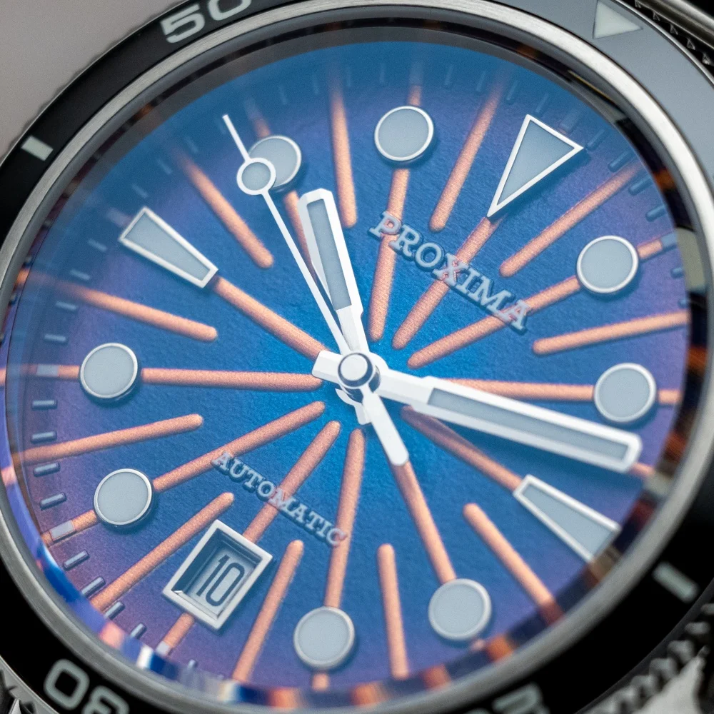 Men’s Proxima 39mm automatic watch with sunburst dial and ceramic bezel.