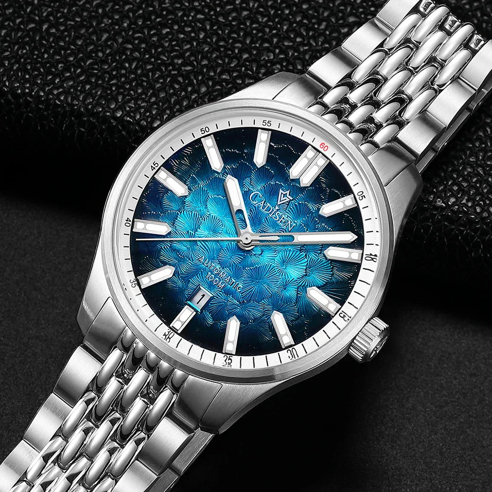 Automatic mechanical men's watch with silver case and blue patterned dial.