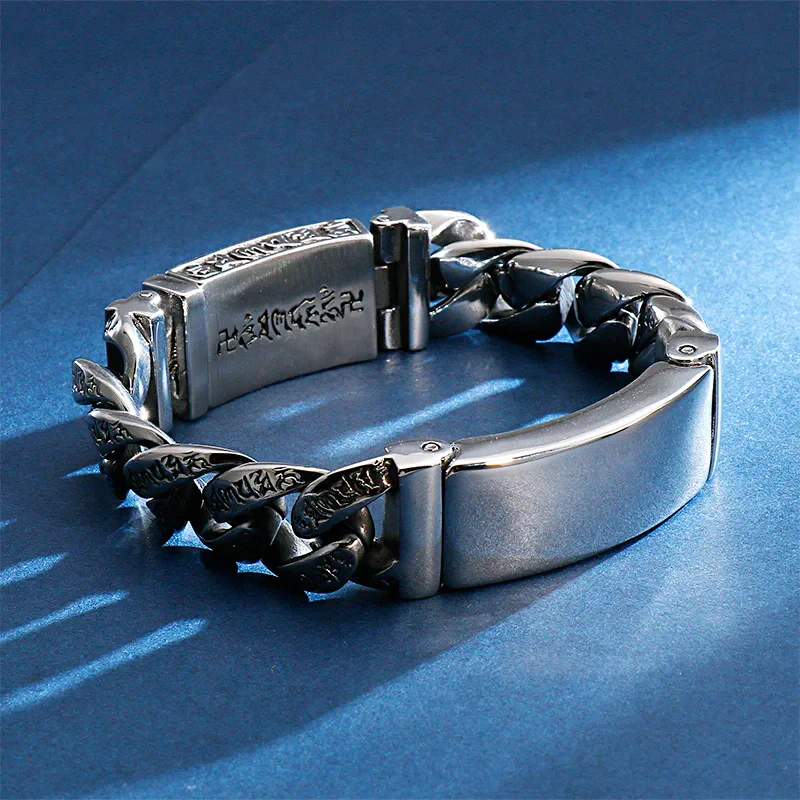 Stainless steel men's skull bracelet with bold chain links and detailed skull accents. Perfect for e.
