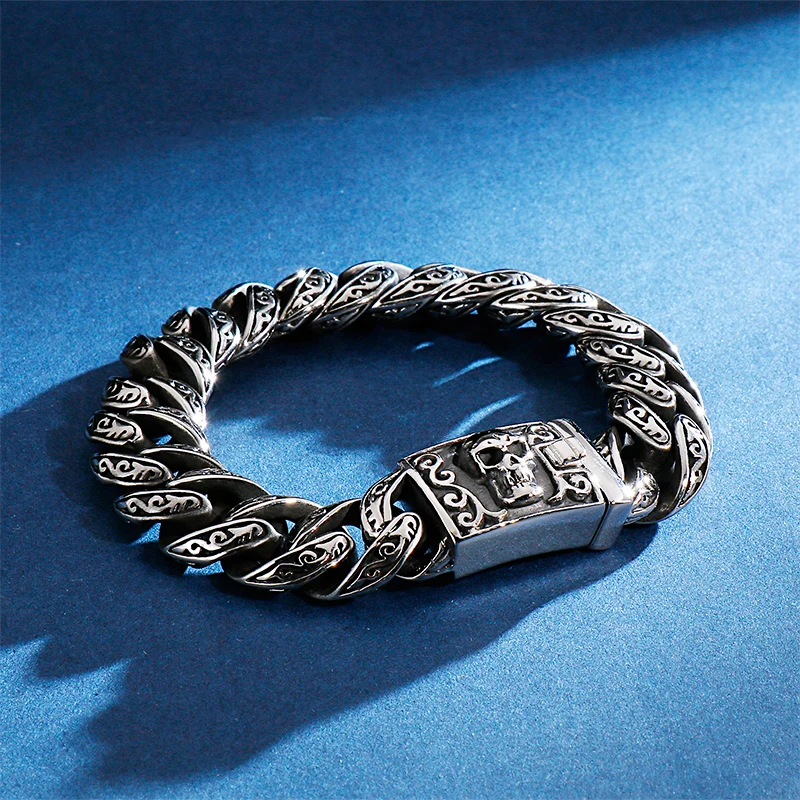 Stainless steel skull bracelet with intricate design, perfect for men's jewelry.