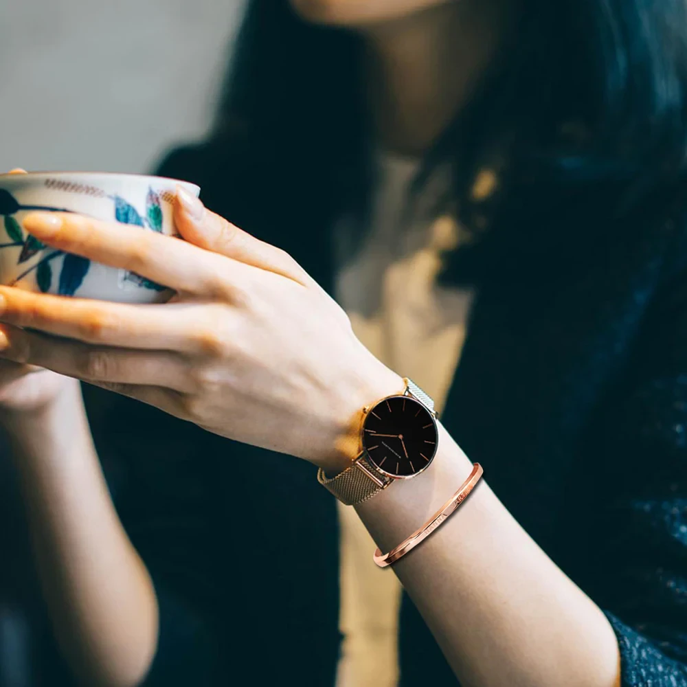 Elegant minimalist 36mm watch with matching bracelet for women.