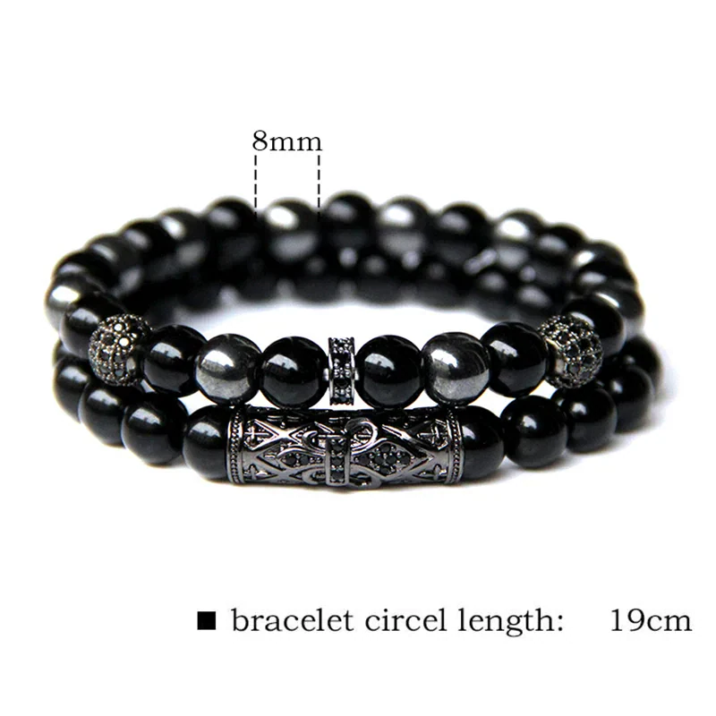 Black stone beaded bracelet for men with silver accents, 19cm length.