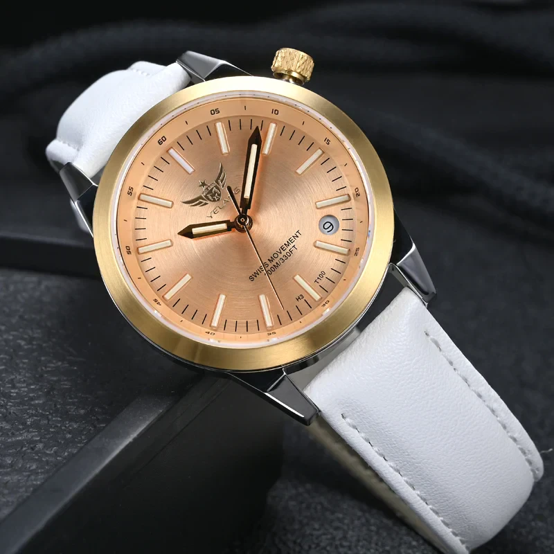 Elegant women's wristwatch with gold-tone bezel and white leather strap.