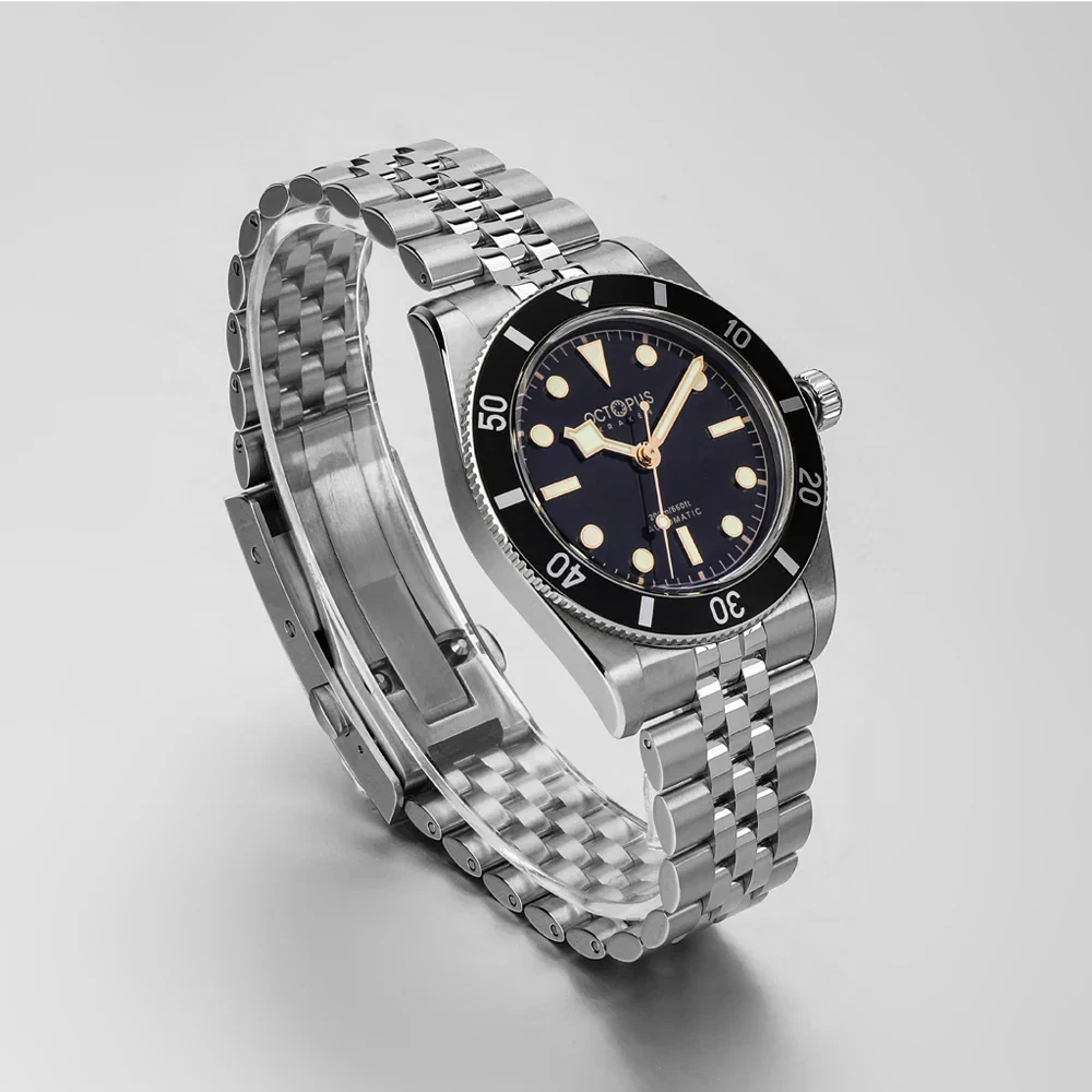 Luxury Octopus Kraken dive watch with stainless steel bracelet and luminous dial.