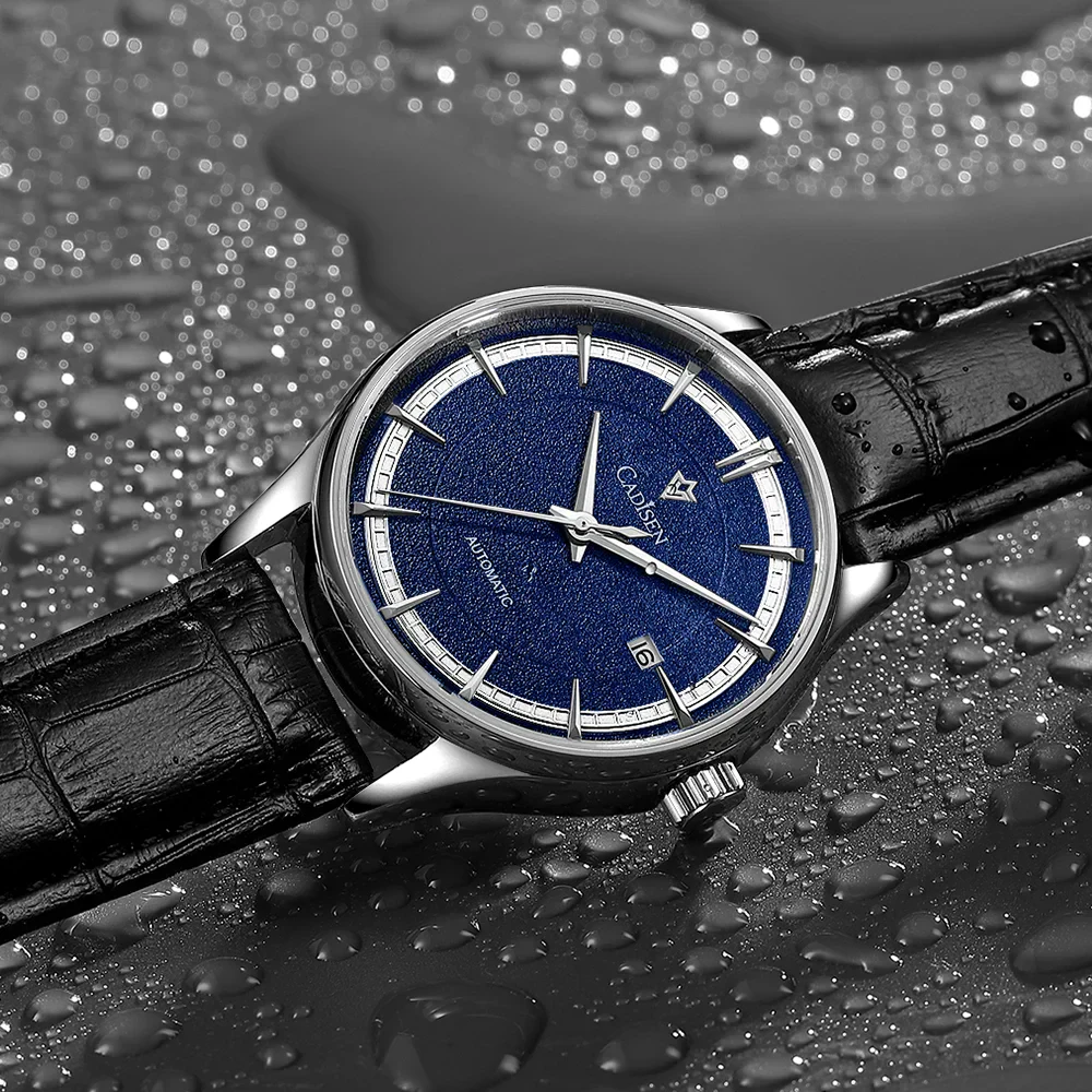 Men's automatic watch with leather strap, sapphire glass, and date display.