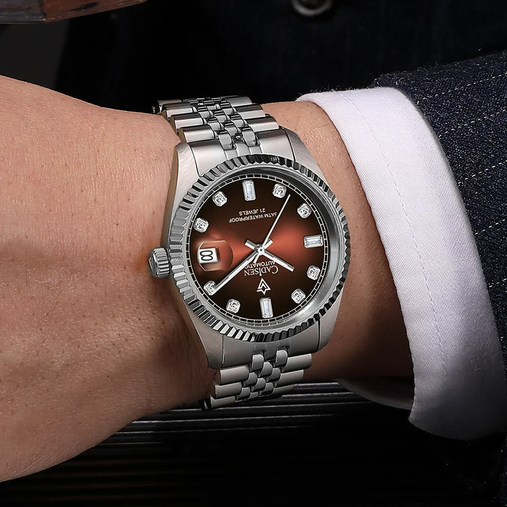 Elegant men's automatic watch with stainless steel band and brown dial.