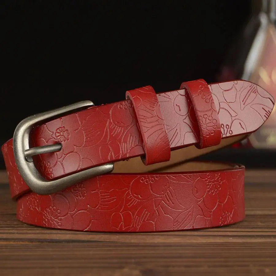 Genuine leather women's belt with floral carved design, stylish and durable accessory. Perfect for c.