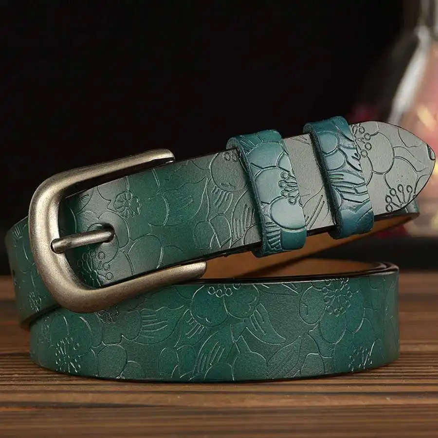 Genuine leather women's belt with floral carved pattern, stylish and durable accessory. Perfect for.