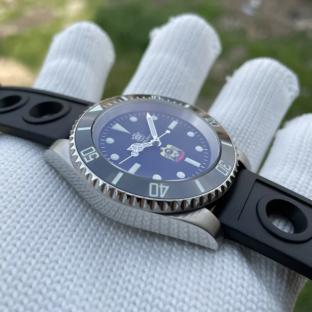 Water Ghost mechanical dive watch with stainless steel case and black rubber strap.