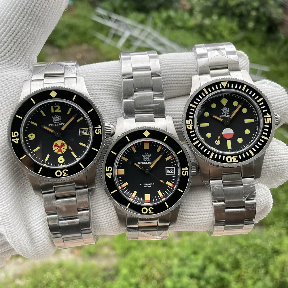 Steeldive 1962 62 MAS dive watch with black dial and stainless steel bracelet.
