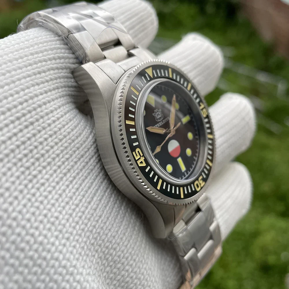 Close-up of STEELDIVE 1962 62 MAS dive watch with black dial and luminous markers.