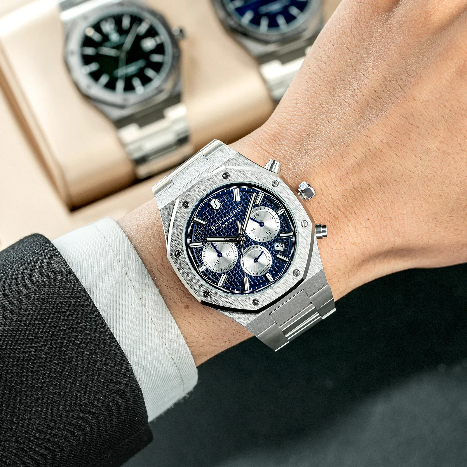 Men's stainless steel waterproof chronograph watch with glowing hands and date display.