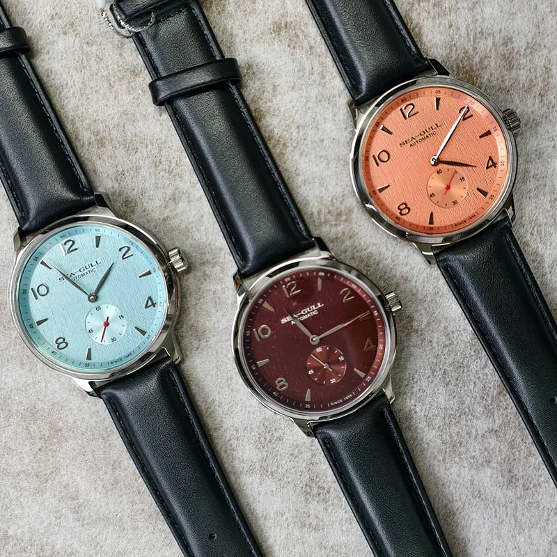 Automatic men's watch with blue dial and sapphire glass.