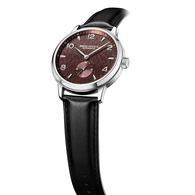 Men's automatic watch with blue sapphire glass and leather strap.
