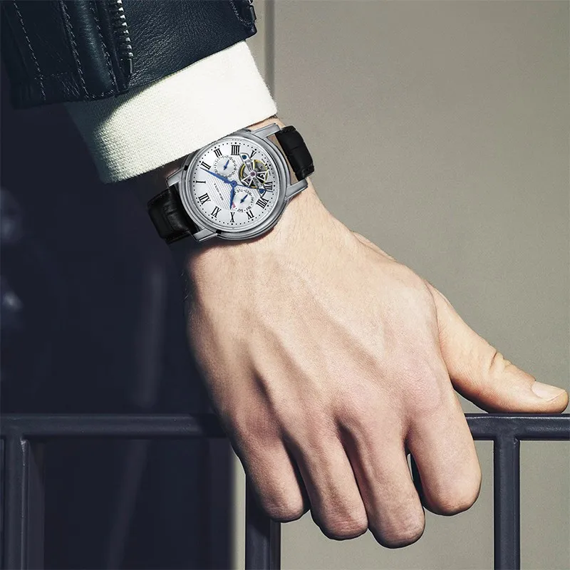 Elegant men's waterproof watch with stainless steel case and leather strap.