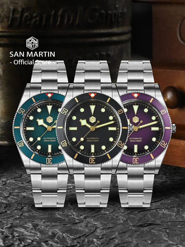 Three San Martin vintage diver watches with stainless steel bands and colorful bezels.