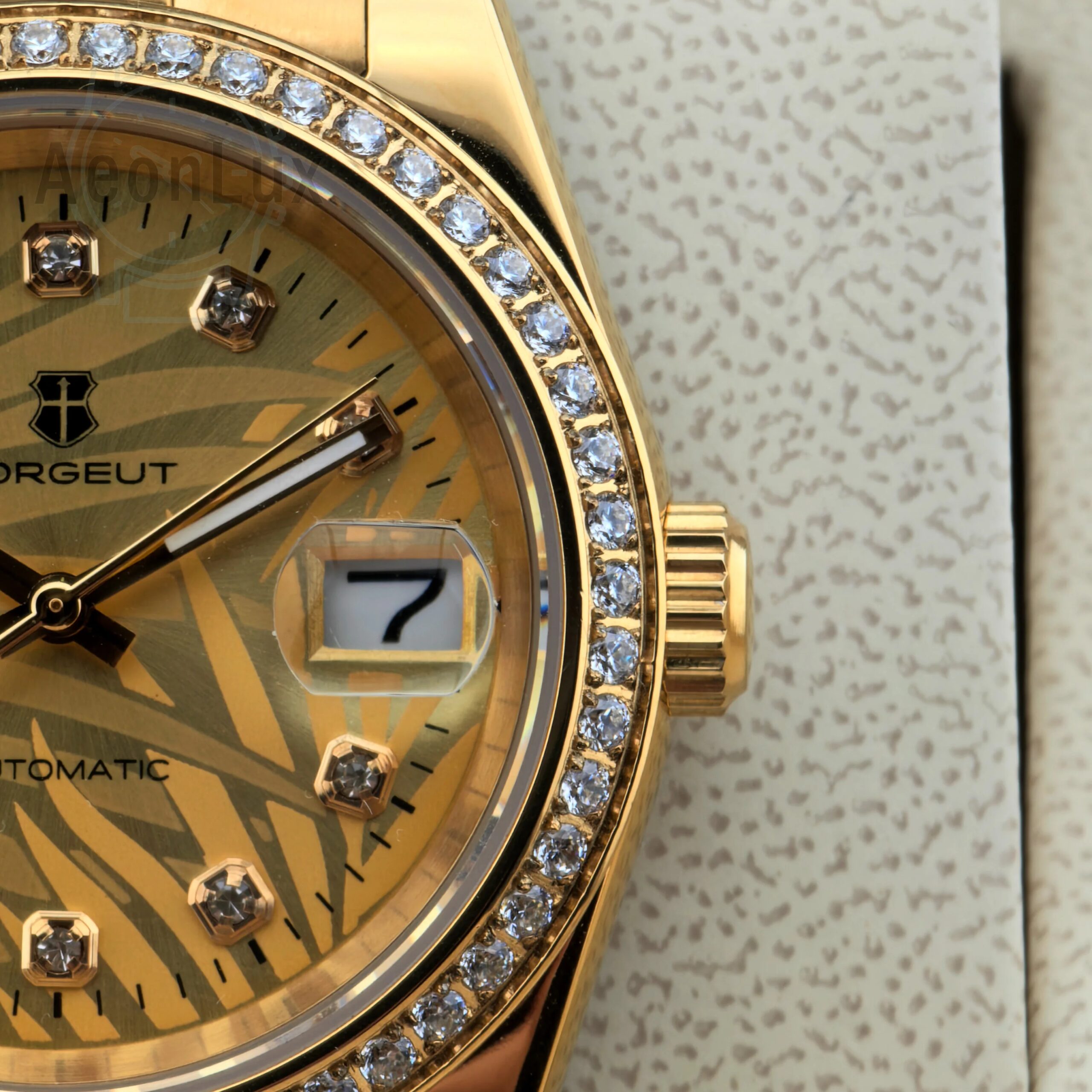 High-end men's watch with diamond details, sapphire crystal, and automatic movement.