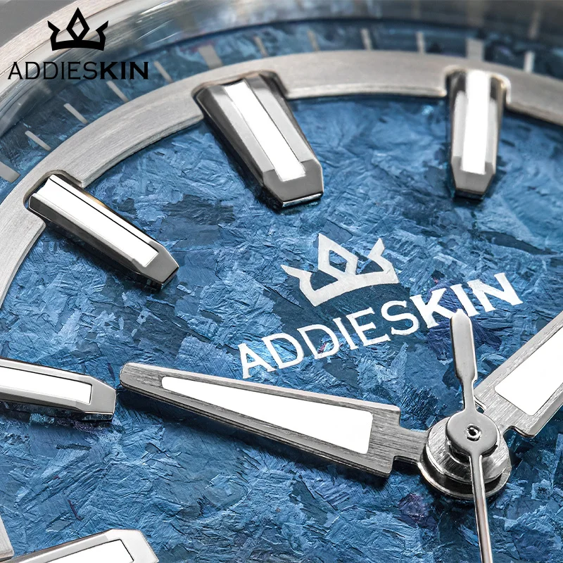 Elegant titanium men's watch with luminous hands and sapphire glass.