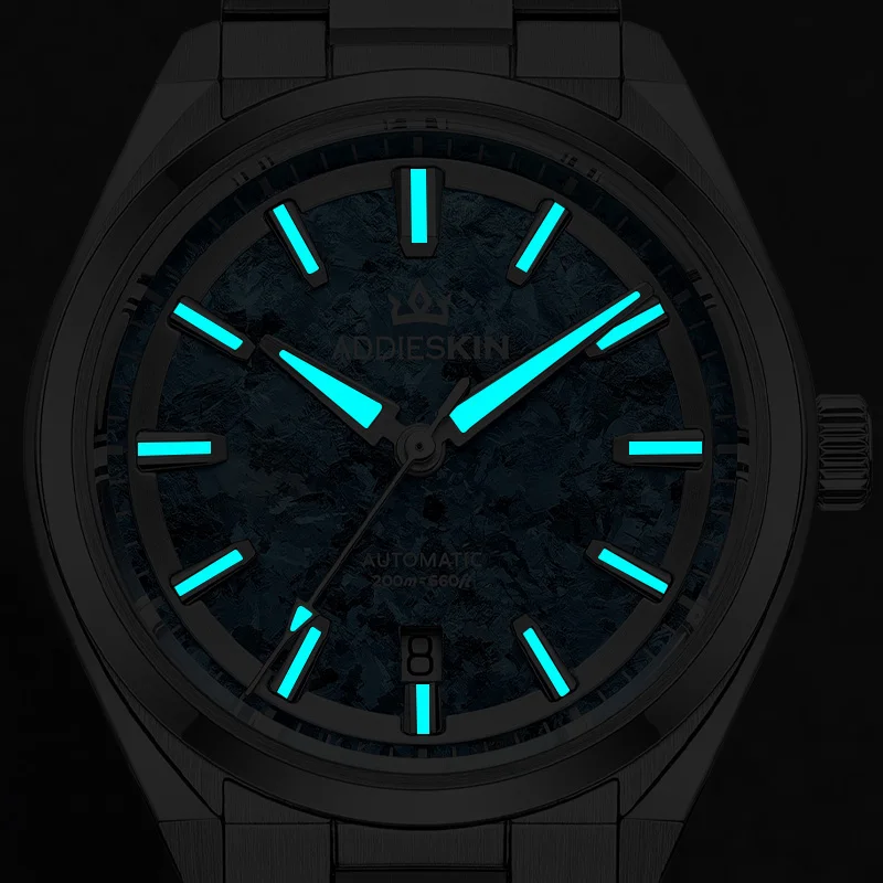 High-tech titanium men's watch with luminous blue accents.