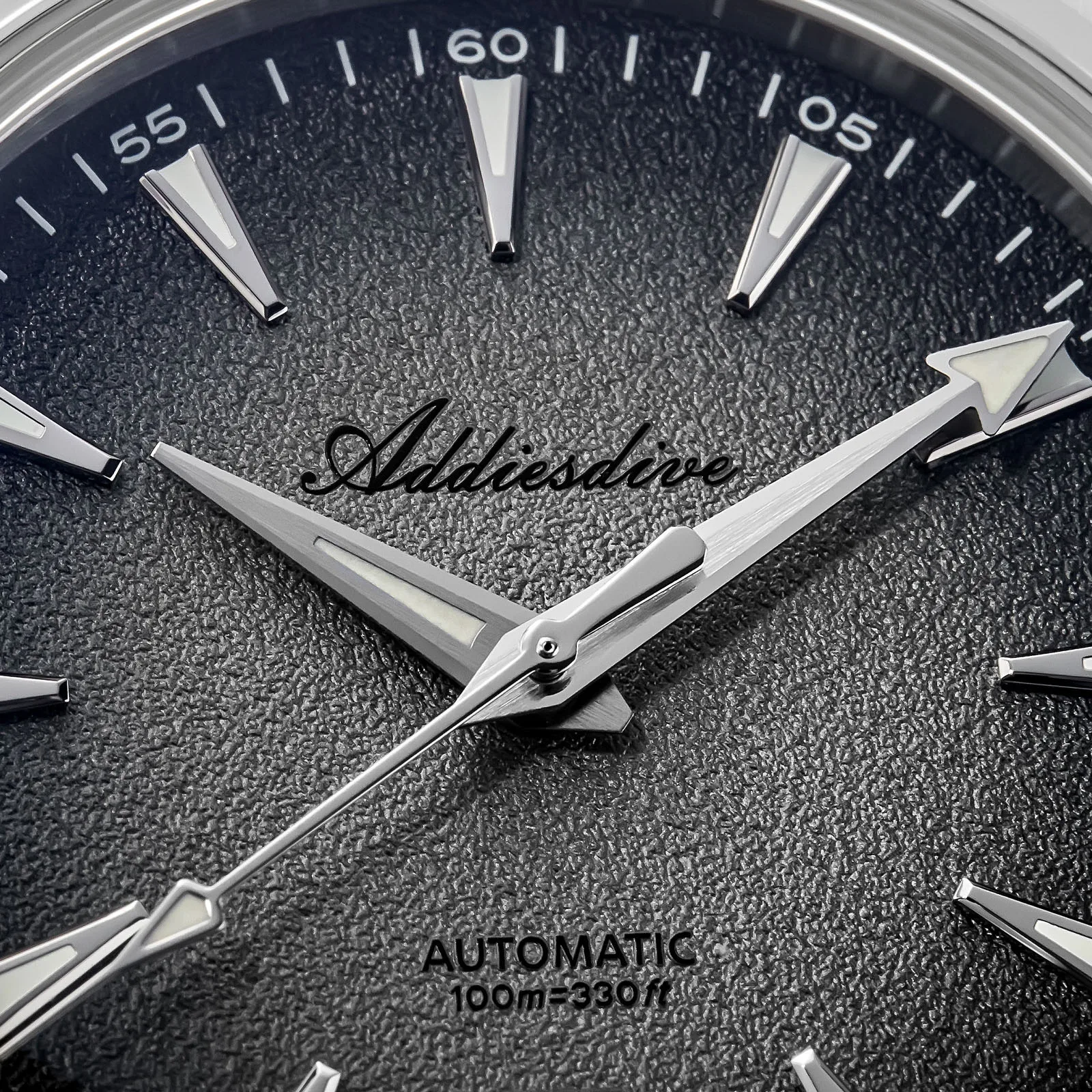 Automatic men's watch with blue luminous dial and stainless steel case.