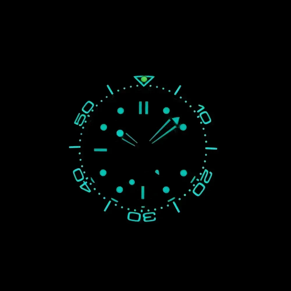 Luminous dive watch with glow-in-the-dark features for underwater visibility.