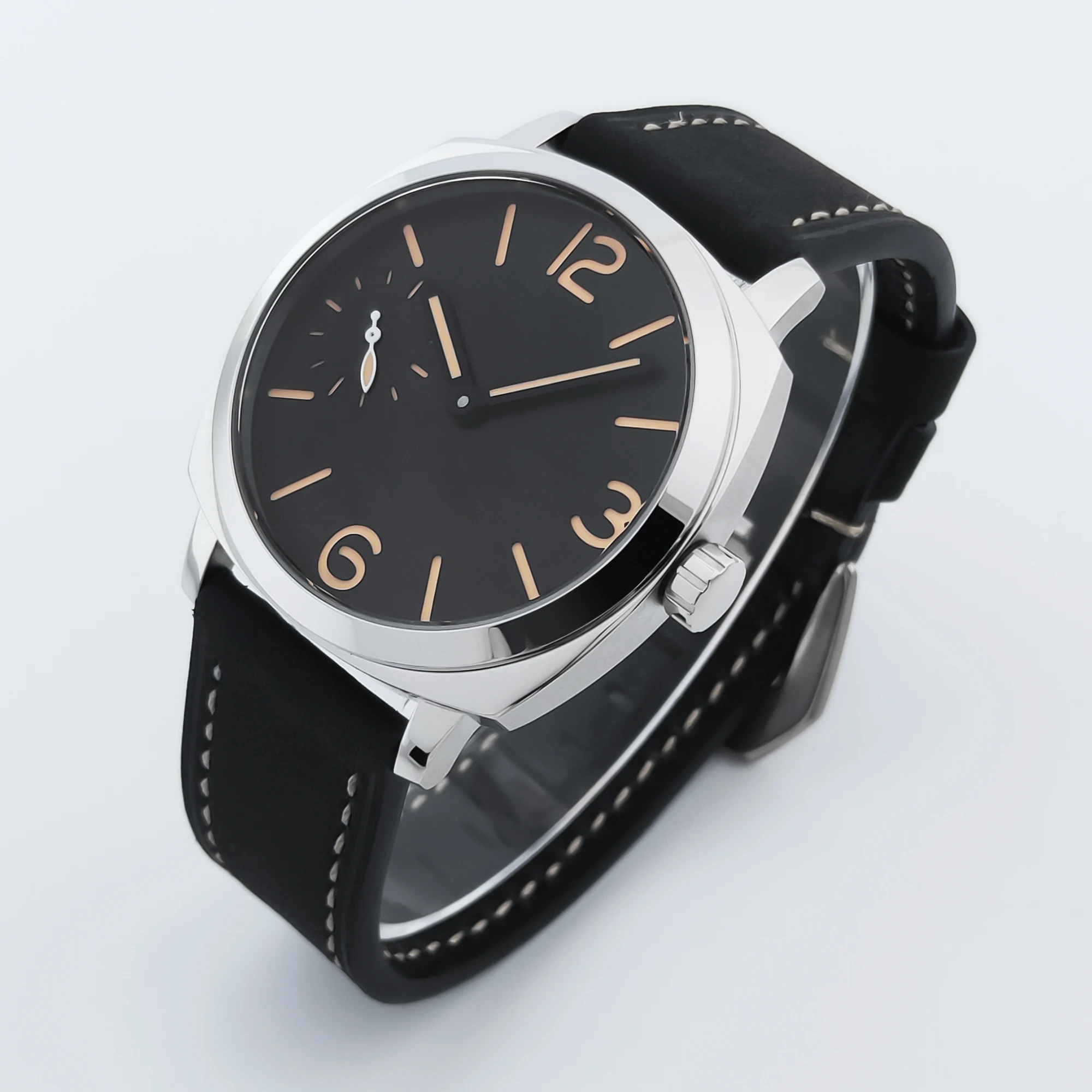 Elegant black dial wristwatch with silver case and black leather strap.