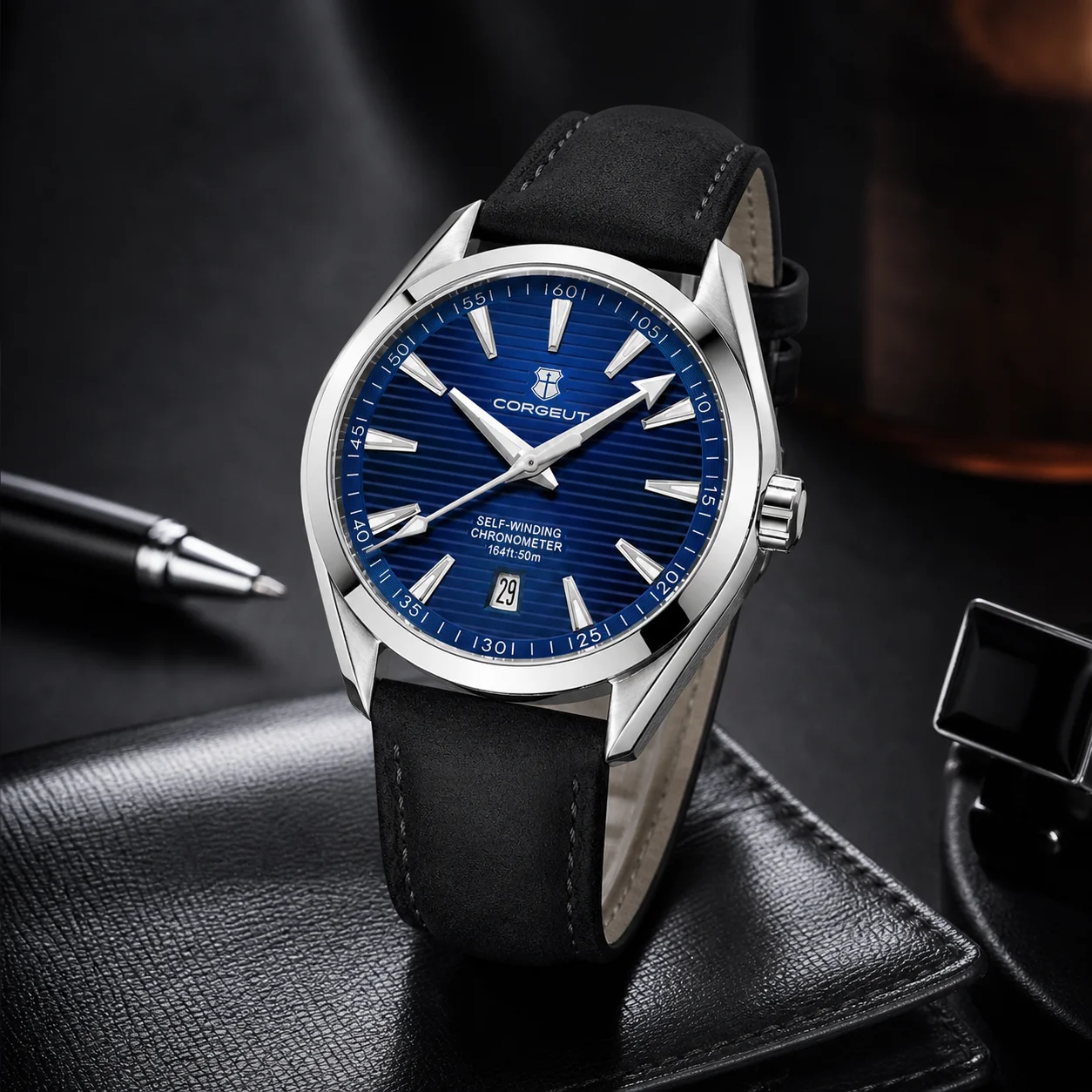 Men's luxury wristwatch with blue dial and black leather strap.