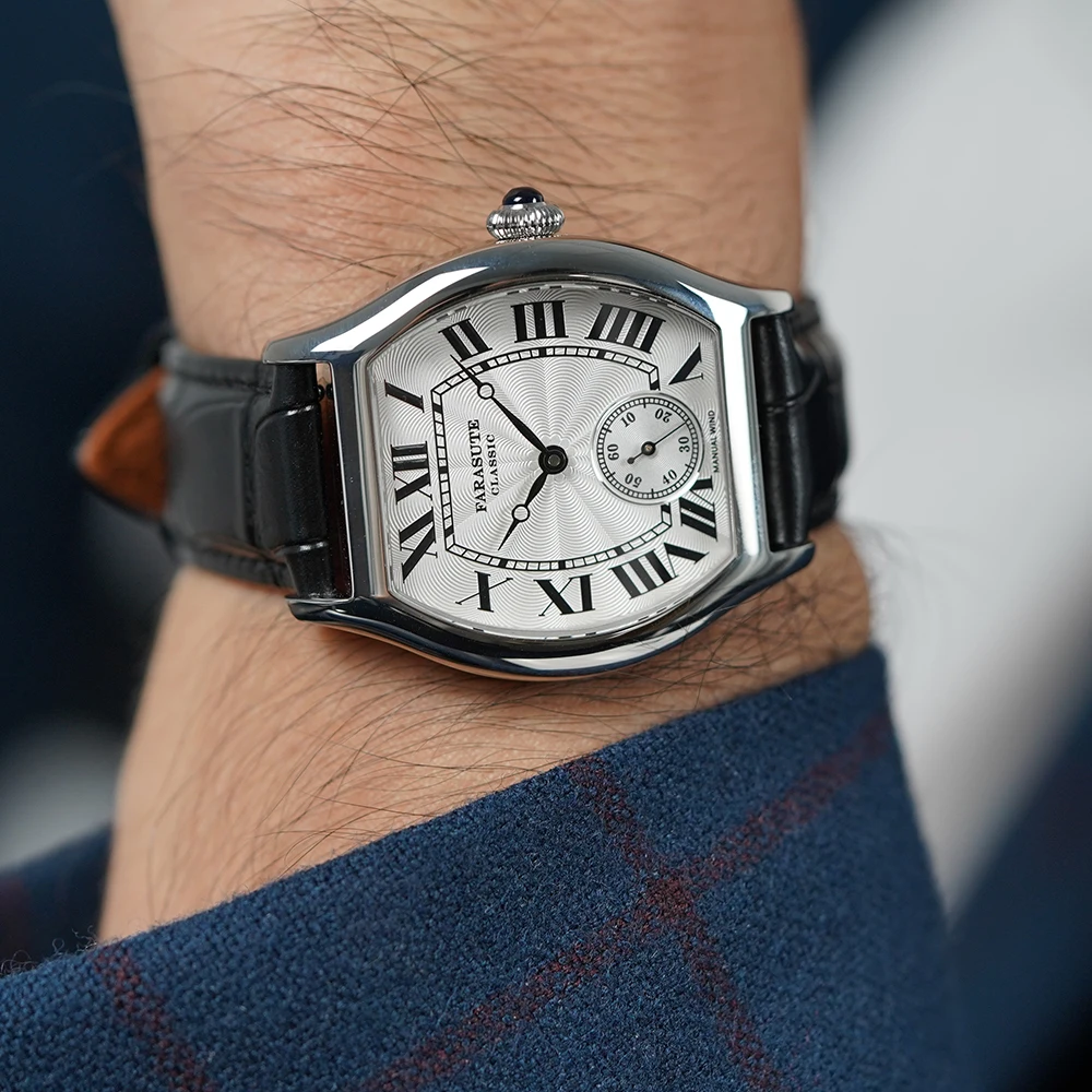 Men's luxury wristwatch with black leather strap and silver dial featuring Roman numerals.