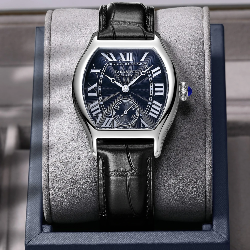 Luxury men's wristwatch with black leather strap and silver case.